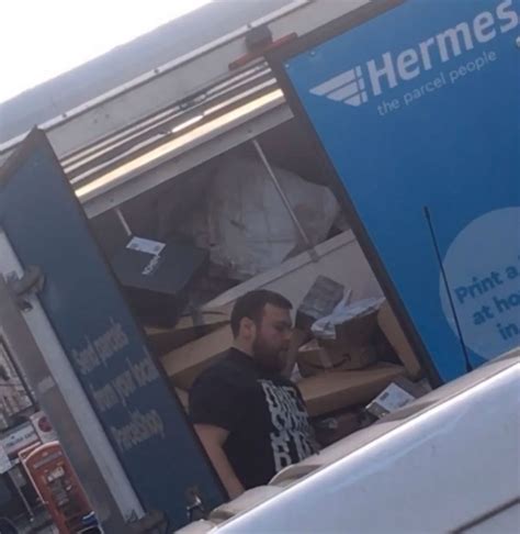 Shocking moment Hermes driver HURLS parcels into back of